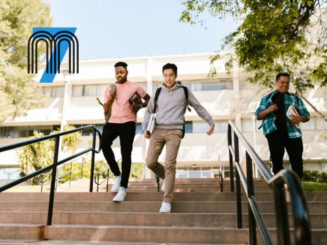 College Students Walking Down Campus Steps