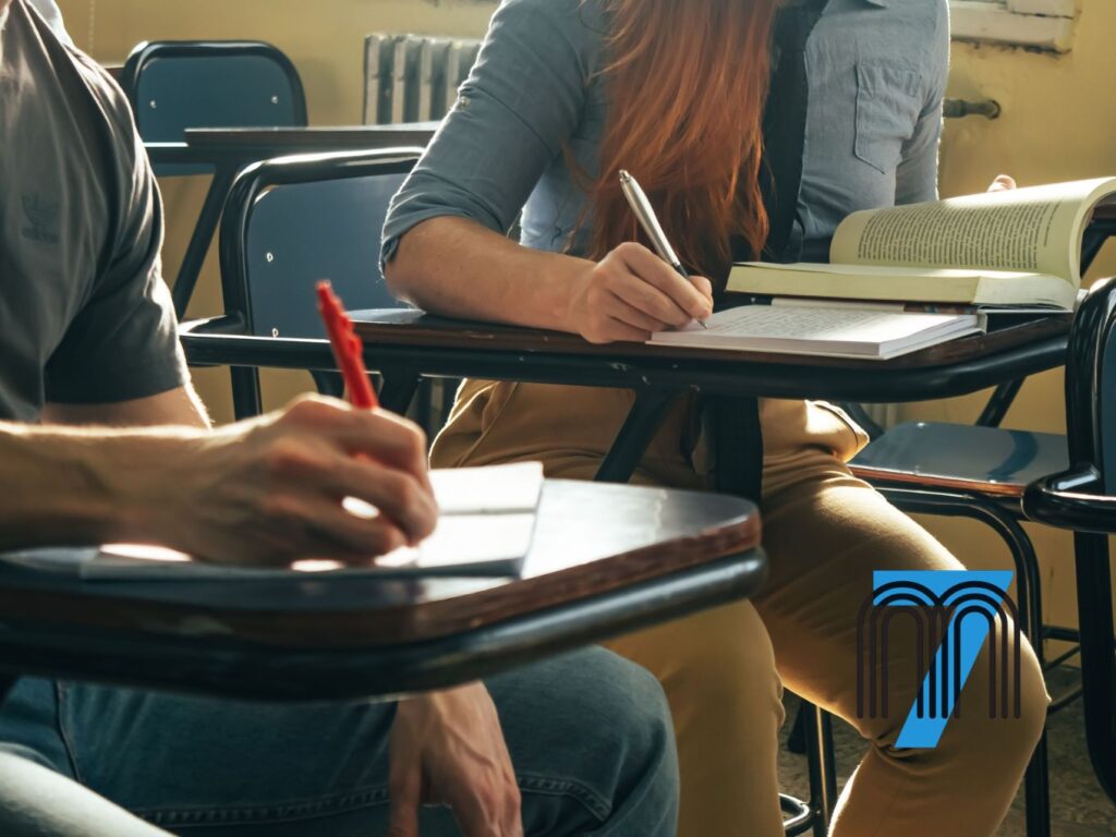 Students Taking Notes in a Classroom